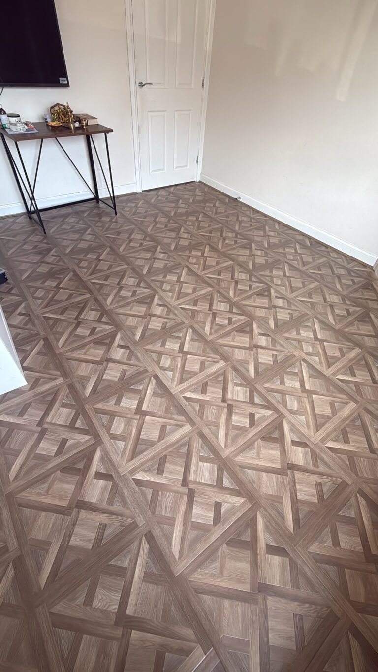 Versailles parquet-pattern wood-effect flooring fitted in a living room