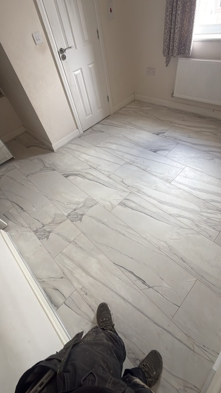 White marble-effect laminate fitted in a room with a radiator