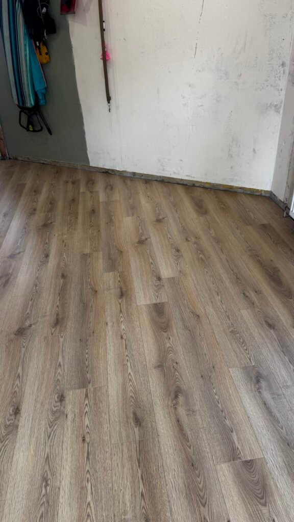 AGT oak-effect laminate fitted by Prime Carpets & Flooring