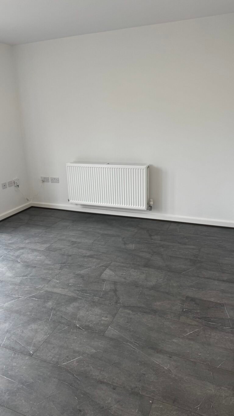 Grey stone-effect laminate fitted in a living room