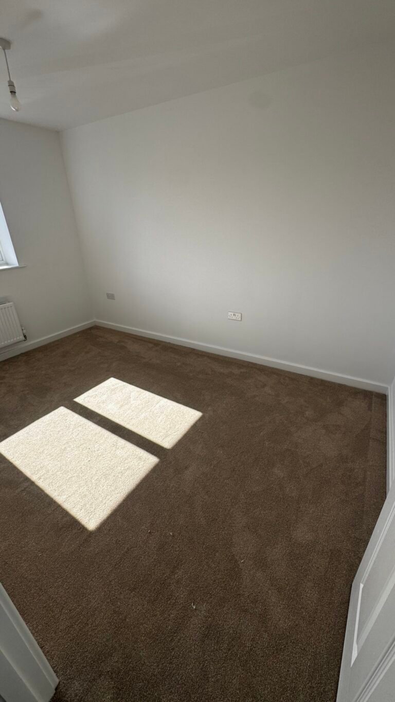 Mocha saxony carpet fitted in a bedroom in Leyland