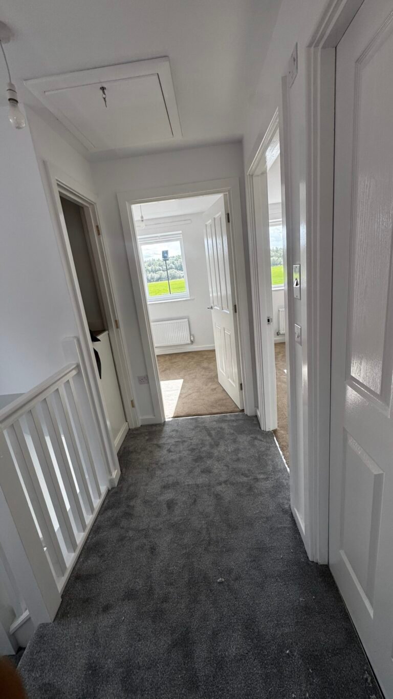 Grey carpet fitted along an upstairs landing