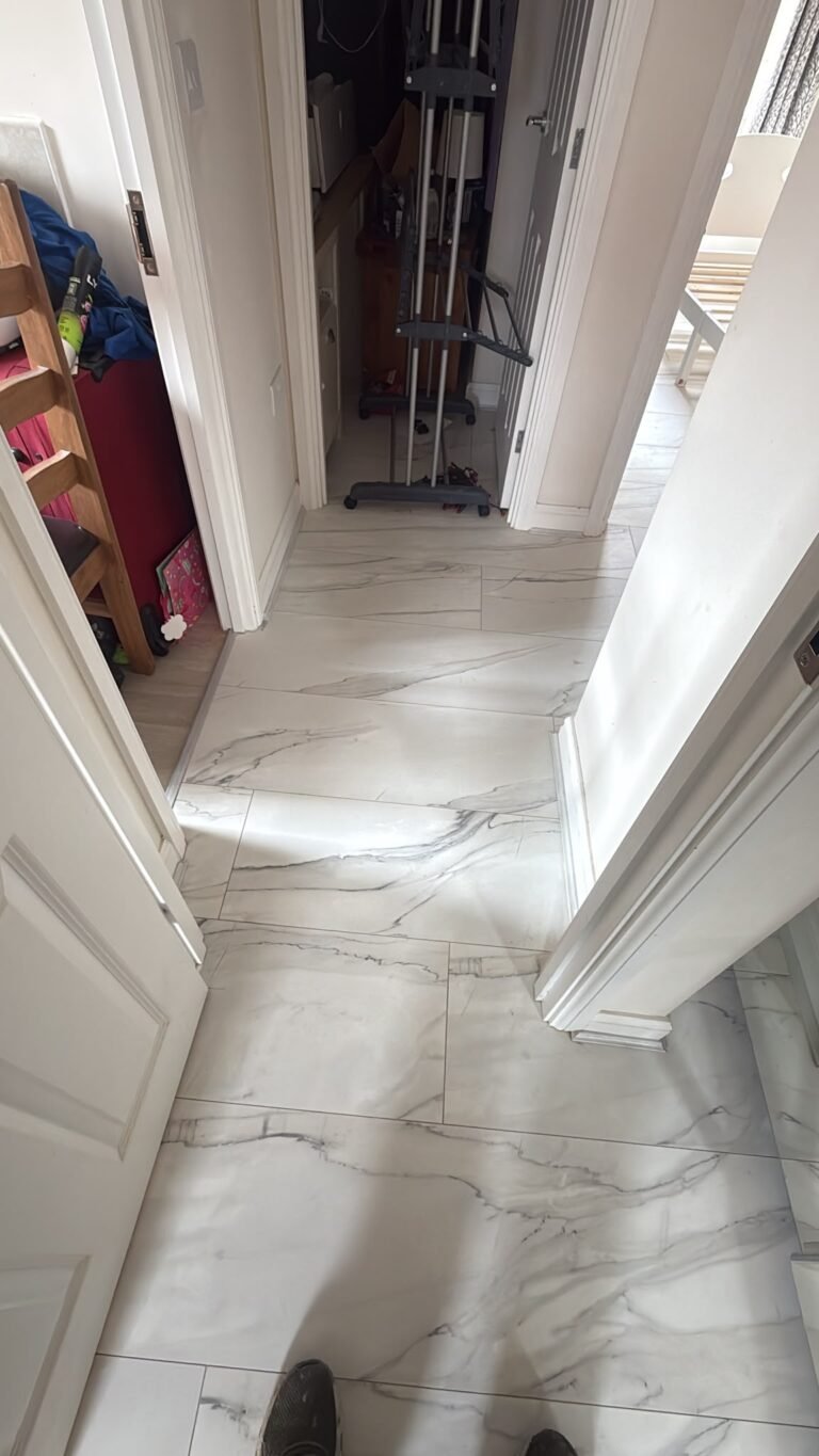 White marble-effect laminate fitted along a hallway